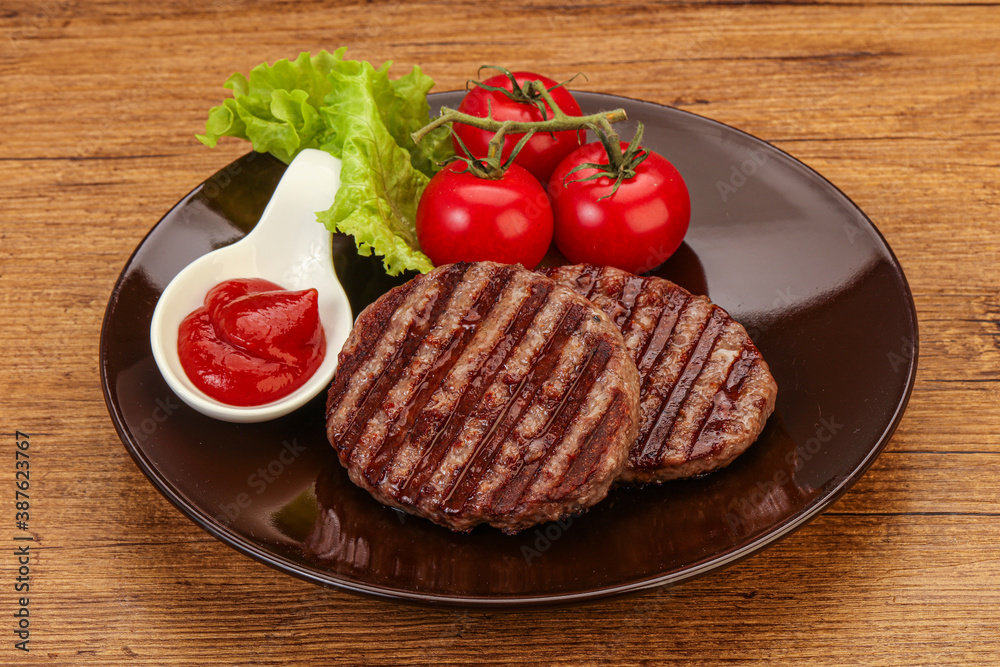 Grilled burger cutlet with sauce Grilled burger cutlet with sauce