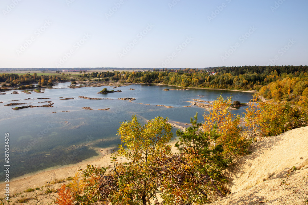 Beautiful view of the lake with islands and yellowed trees