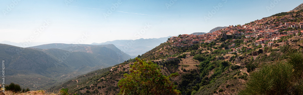 Stunning Greek Mountainside Panorama with Town and Valley