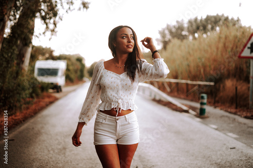 moroccan girl in the dunes of the south of spain and beach coast white tarifa bolonia