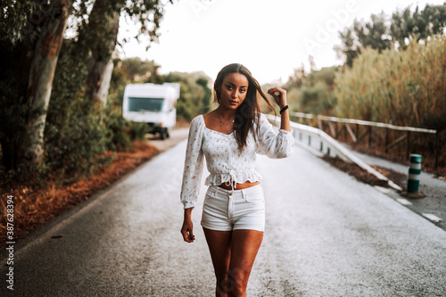 moroccan girl in the dunes of the south of spain and beach coast white tarifa bolonia