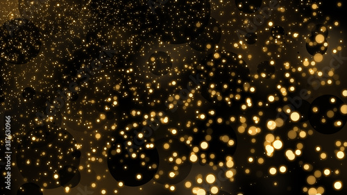 Gold glitter background with bokeh effect. Abstract golden shiny dust. Decorative bright background and wallpaper.
