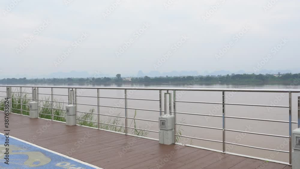 beautiful view of Mekong River and bicycle lane at riverside in the morning