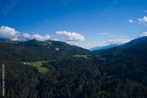Panorama of beautiful countryside of Italy. Mountainous countryside at high noon. beautiful rural scenery with trees and fields on the rolling hills at the foot of the ridge.