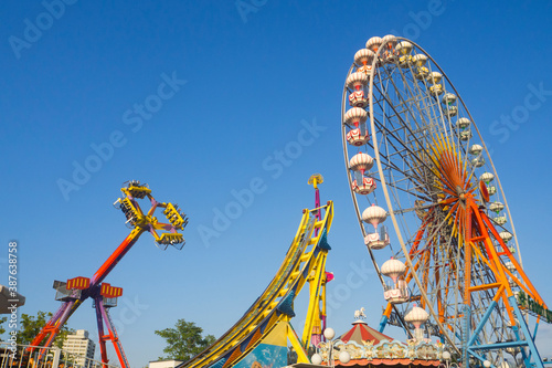 Fotografiet amusement park, theme park and funfair, big ferris wheel and color images - Turk