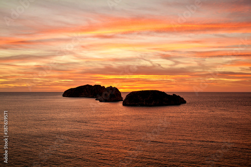 Sunset at malgrats small islands in mallorca photo