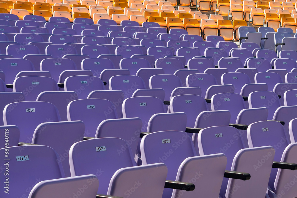 Naklejka premium Empty plastic chairs background