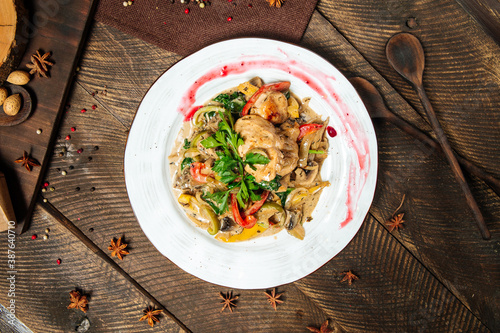 Chicken breast with mushroom sauce and vegetables