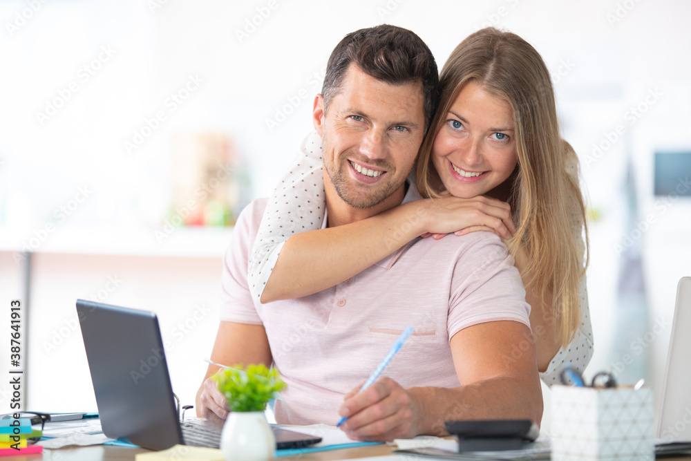 happy people looking at laptop happy people looking at laptop