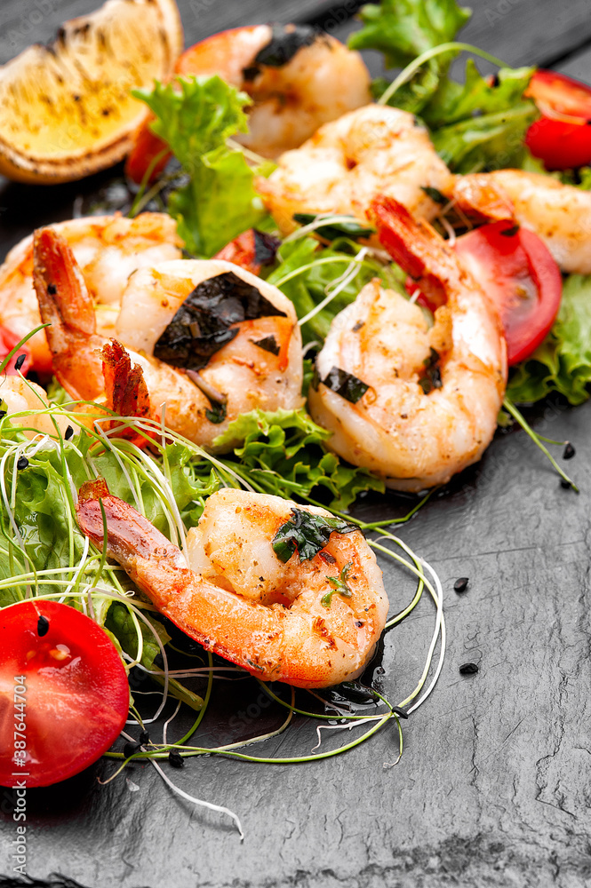 Grilled shrimps with fresh vegetables. Shrimp salad. Grilled shrimps with fresh vegetables. Shrimp salad.