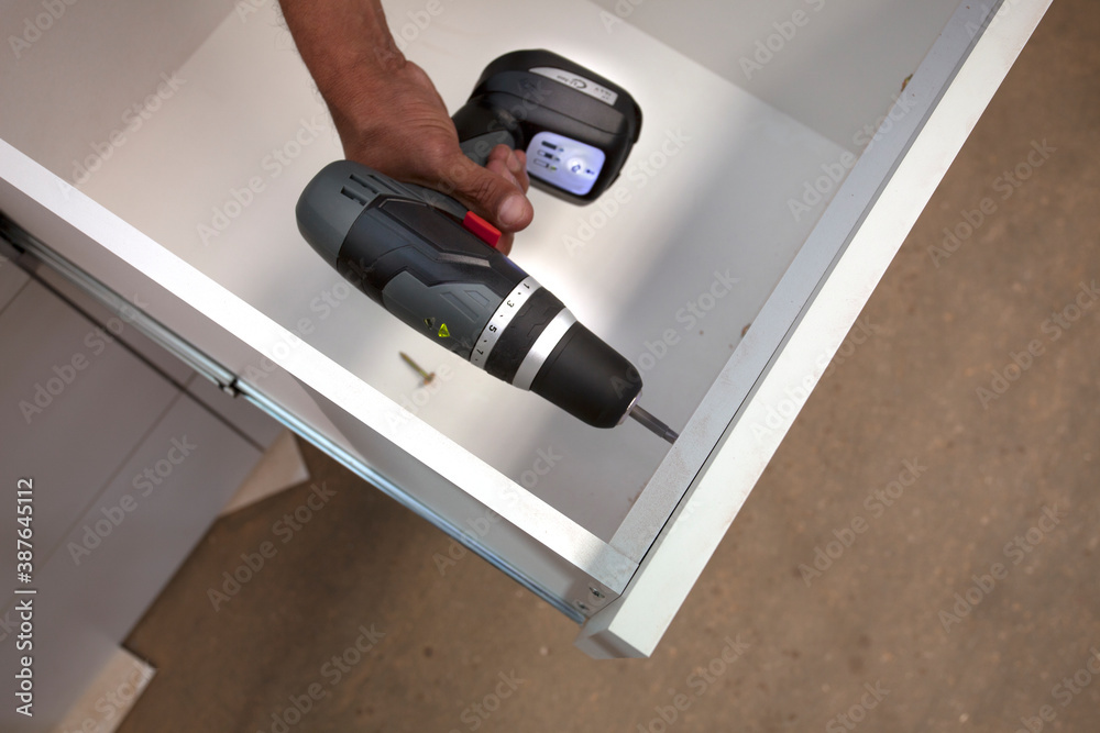 working with battery screwdriver working with battery screwdriver