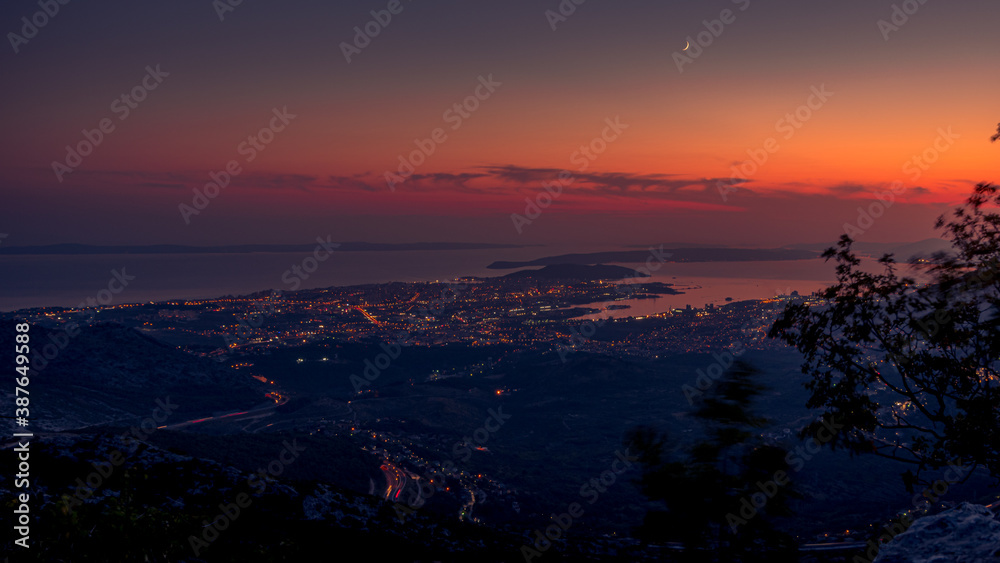 Panorama of city and the surrounding area, a view from Mosor mountain. Night n Split, Croatia.