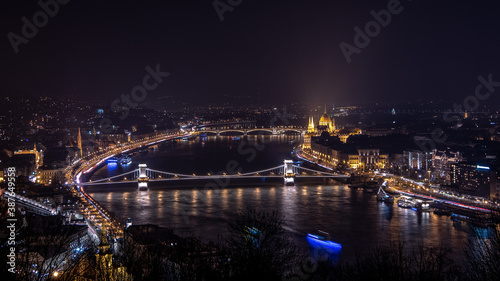 Panorama of the city, Danube river, and Hungarian Parliament Building. Night in Budapest, Hungary.