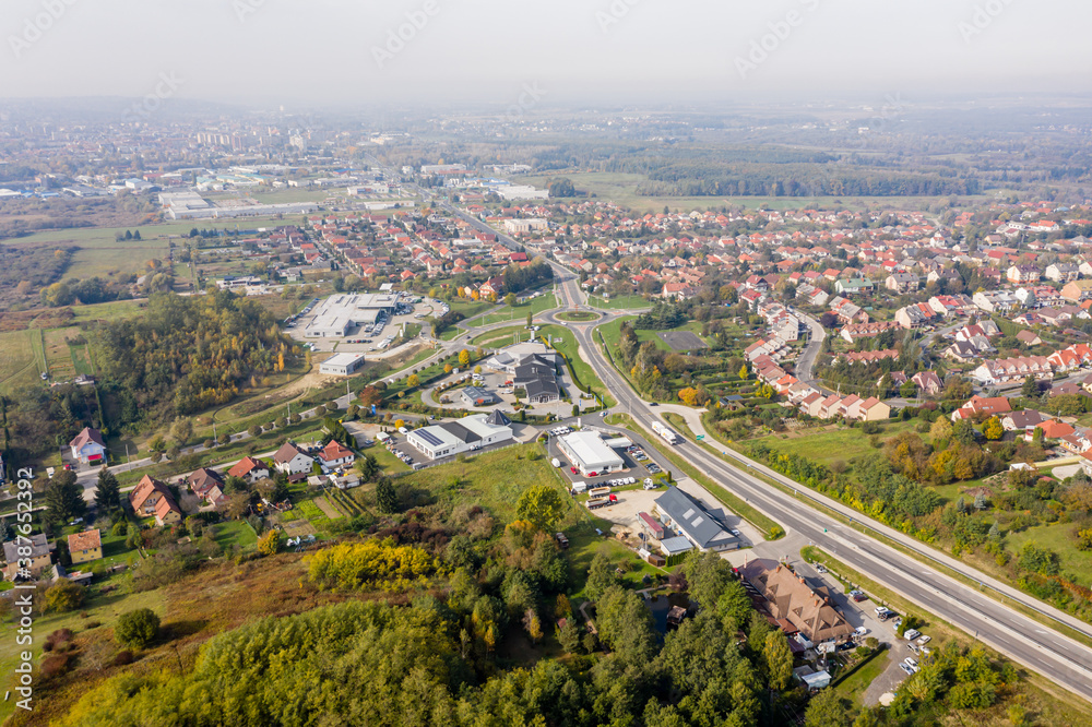 Drone photo of a roundabout in Csacs district on a foggy autumn morning in City Zalaegerszeg, Hungary