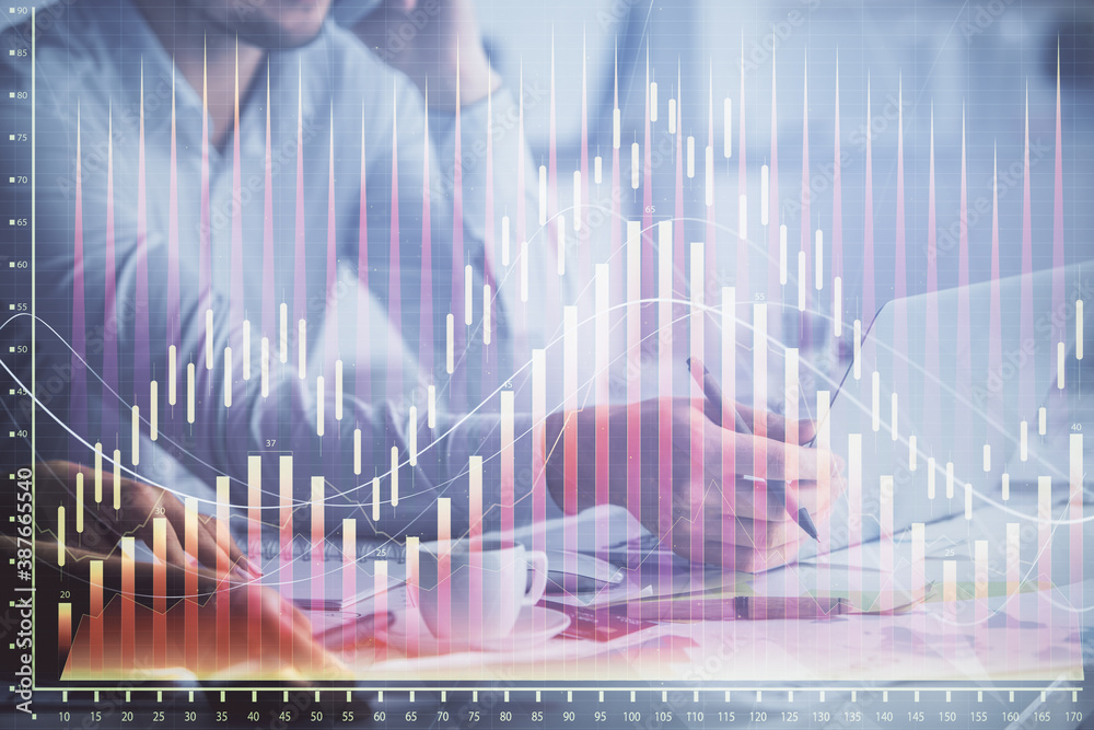 Double exposure of man and woman working together and financial graph hologram. Business concept. Computer background. Double exposure of man and woman working together and financial graph hologram. Business concept. Computer background.