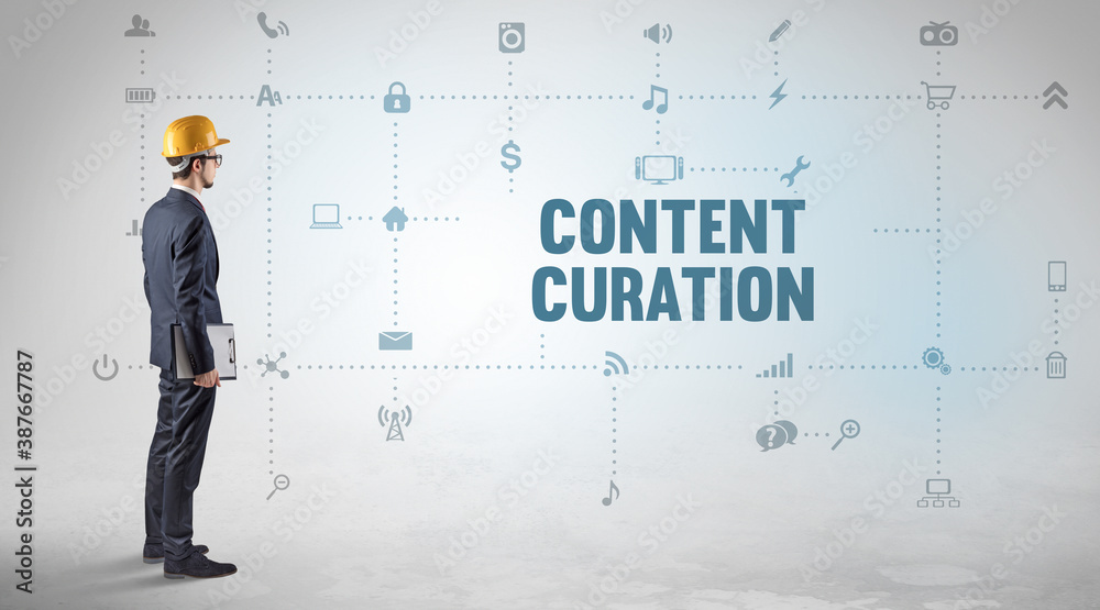 Engineer working on a new social media platform with CONTENT CURATION inscription concept Engineer working on a new social media platform with CONTENT CURATION inscription concept