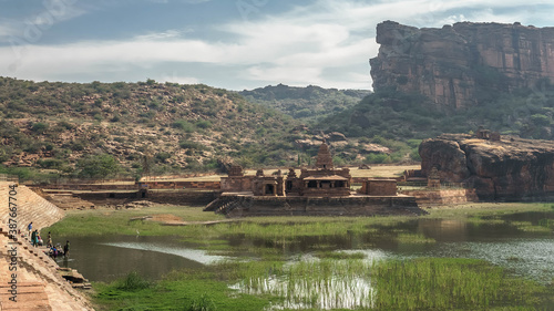 Badami  a small town in central Karnataka  is famous for its four rocky cave temples carved from a reddish sandstone in the mountain