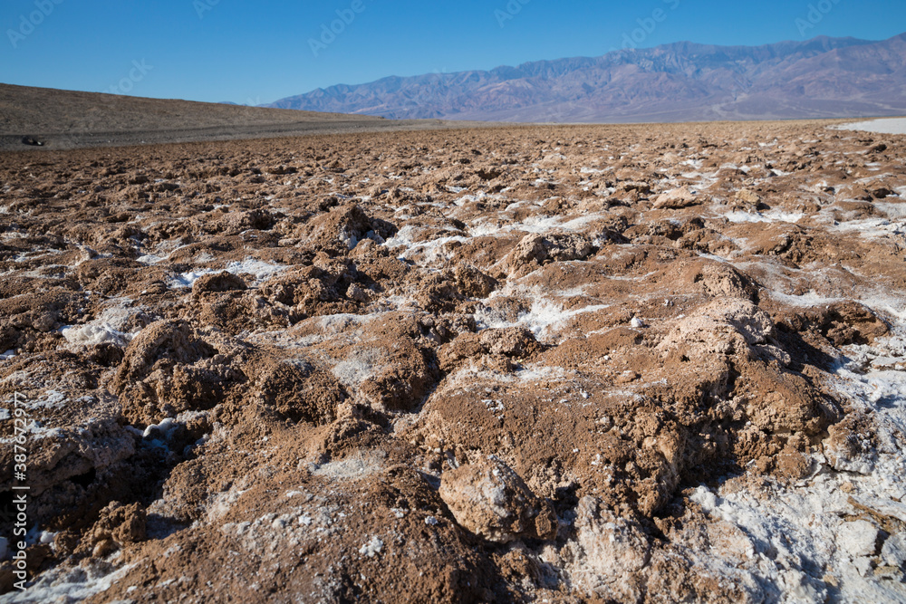 The salt bed of Badwater Basin, the lowest point in North America at -282 feet, in Death Valley National Park in California. The salt bed of Badwater Basin, the lowest point in North America at -282 feet, in Death Valley National Park in California.