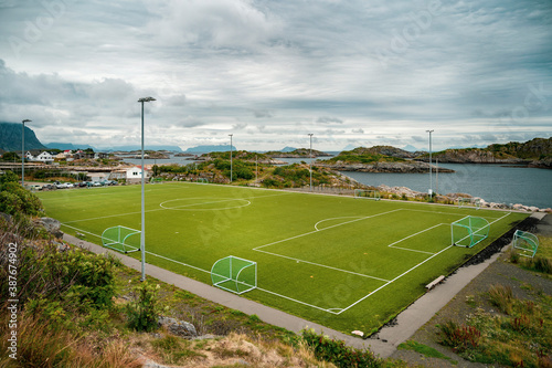 Aerial field of famous football pitch on small island in little village of Henningsver in Lofoten  Norway.