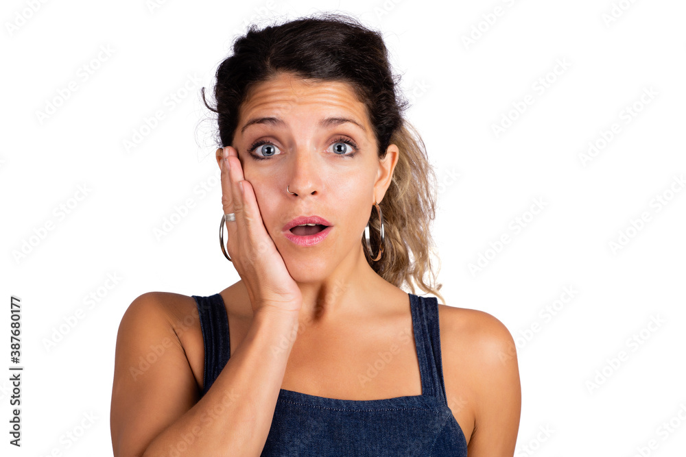 Young beautiful woman with shocked expression. Young beautiful woman with shocked expression.
