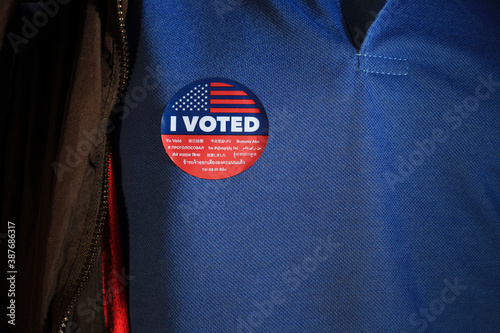 I voted sticker on man's shirt