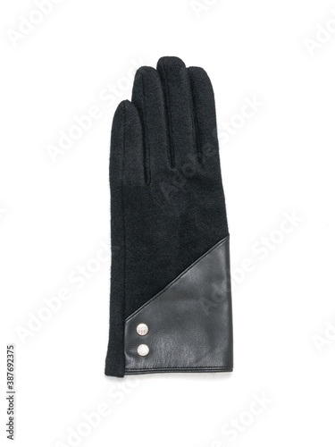 Black women's glove with two buttons isolated on a white background.