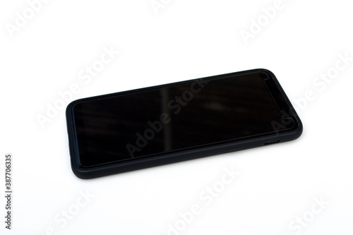 Black smartphone and case on white background.