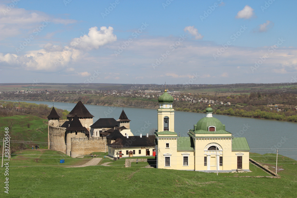 Fototapeta premium old stone castle in a green field