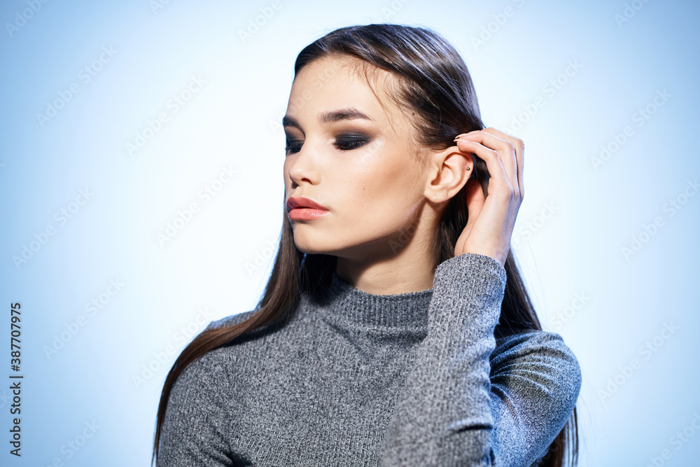 Beautiful woman cosmetics long hair cropped studio model Beautiful woman cosmetics long hair cropped studio model