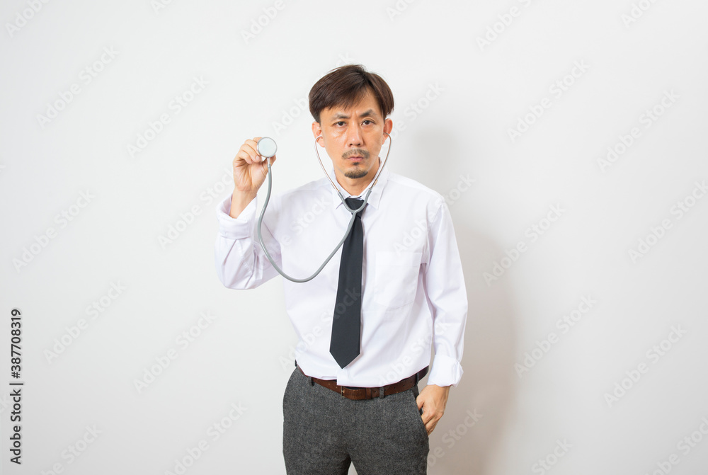 Studio Shot Of Mature Male Doctor Wearing White shirt And Stethoscope Against White Background. Studio Shot Of Mature Male Doctor Wearing White shirt And Stethoscope Against White Background.