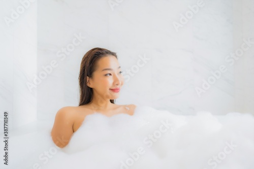 Portrait beautiful young asian woman relax in bathtub