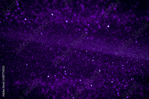 Majestic blue-purple sparkle snow. Cosmic Christmas background for design, cards, posters.