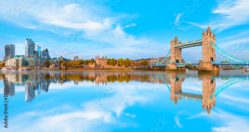 Panorama of the Tower Bridge  Tower of London and modern skyline on Thames river  - London  United Kingdom