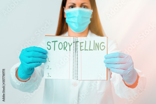 Word writing text Storytelling. Business photo showcasing relater of anecdotes, reciter of tales, writer of stories Laboratory technician featuring empty sticker paper accessories smartphone photo