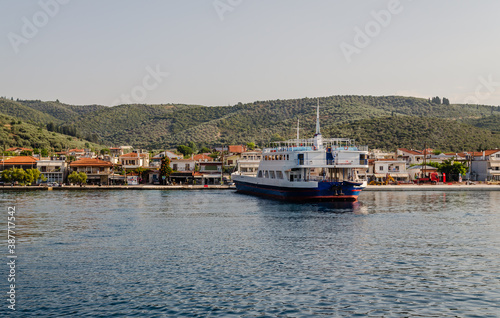 Evia island, Greece - June 28. 2020: Anchored ferry in the port of Edipsos - Greece