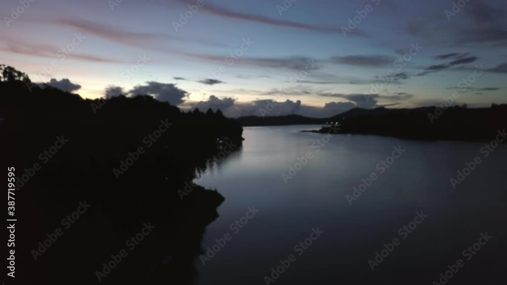 Blurry aerial Kenyir Lake Beautiful Tropical tourist landscapes and island, Malaysia beach surise. Dawn morning noise footage