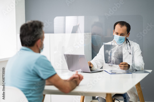 Old Injured Man With Leg Pain At Surgeons Office