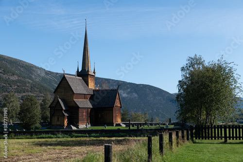 Stave Church of Lom in Norway against a clear blue sky
