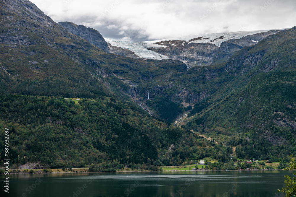 The folgefonna Glacier high above the hardangerfjord in Norway