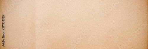 Old texture brown yellow style vintage cardboard sheet of empty paper background.
