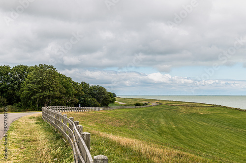Road over the cliffs of Friesland looking out over the IJsselmeer