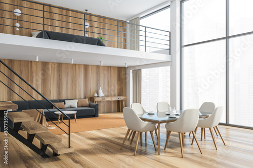 Wooden living room with white chairs and table  wooden stairs and big window