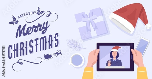 Top view of a man having video conference on tablet with his girlfriend at home on Christmas holiday. Vector