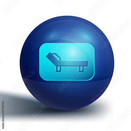 Blue Sunbed icon isolated on white background. Sun lounger. Blue circle button. Vector.