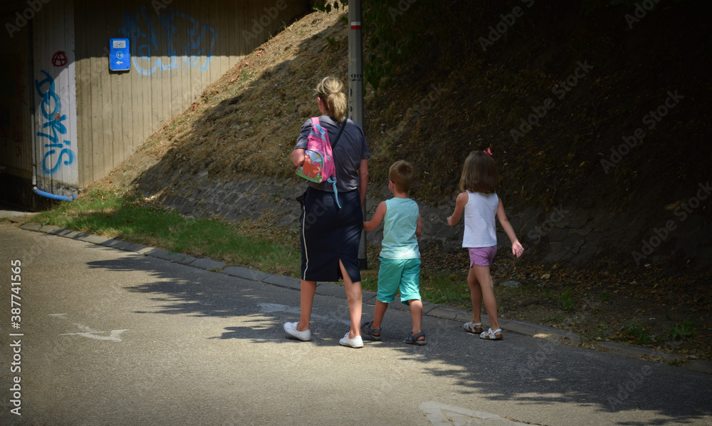 Children with a parent cross the tunnel