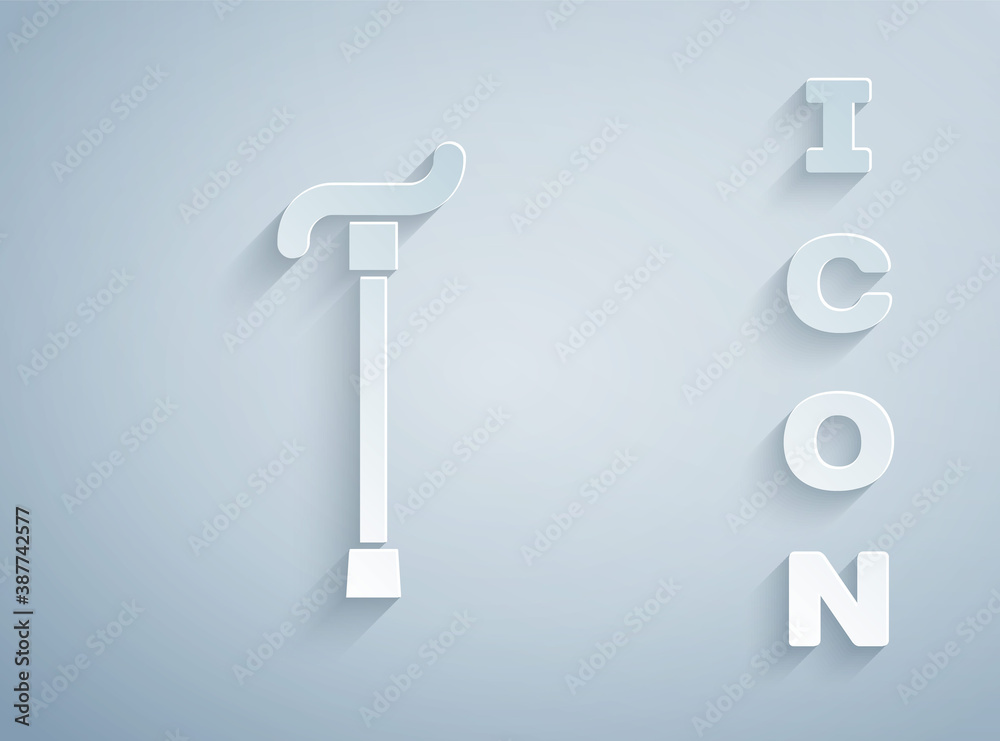 Paper cut Walking stick cane icon isolated on grey background. Paper art style. Vector. Paper cut Walking stick cane icon isolated on grey background. Paper art style. Vector.