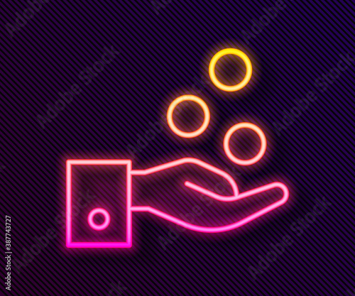 Glowing neon line People paying tips to service staff in restaurant and hotel icon isolated on black background. Tips money cash coin hotel resort service. Vector.