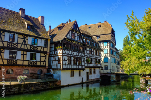 Fachwerk houses on the embankment of Ill river in Strasbourg, France, Alsace.