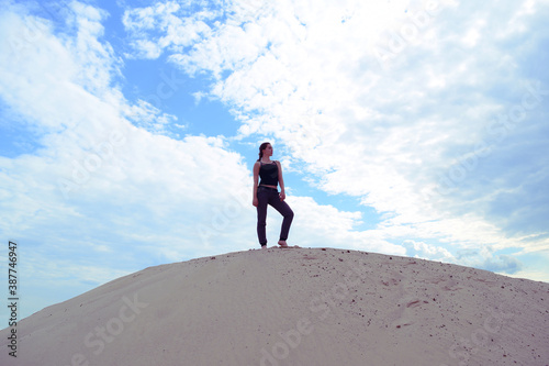 Bottom view of an athletic girl on the sand