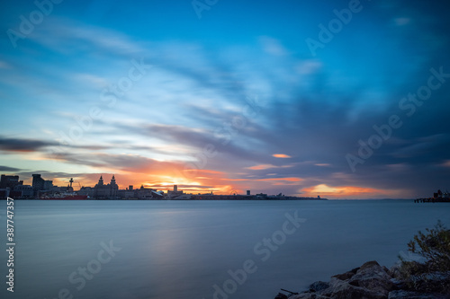 The sun rising over the skyline of Liverpool © Paul